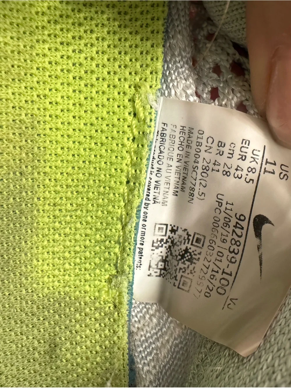 Nike Women’s White and Black Flyknit Sneakers